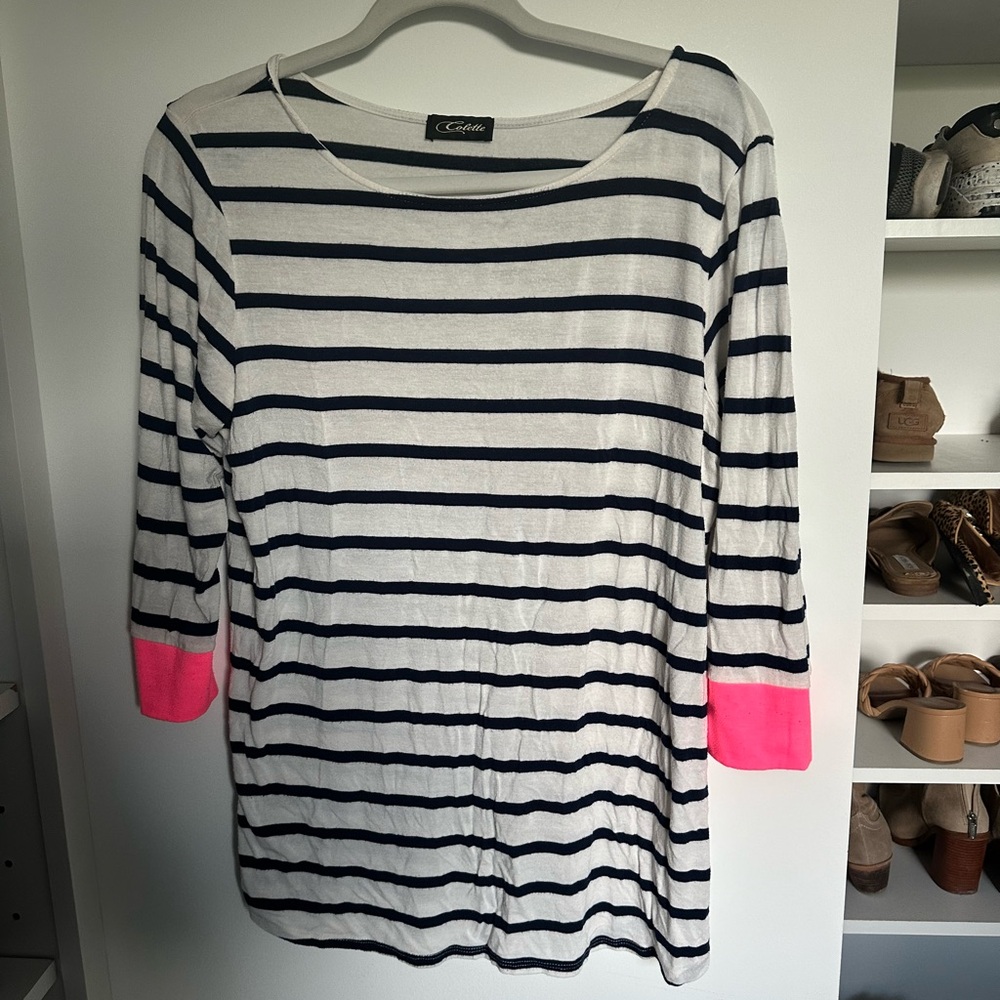 3/4 length sleeve shirt. Very soft and stretchy material